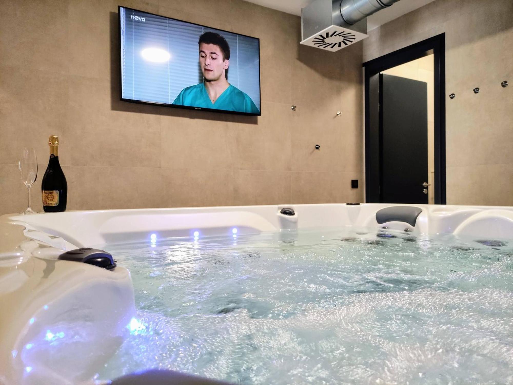 Grand Spa Harrachov: Luxury Wellness Apartment with Jacuzzi & Sauna Room photo